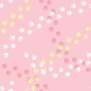 Small scale // Hot dogs chase // pastel pink background white yellow and pink paw prints