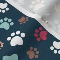 Small scale // Paw prints // navy blue background white aqua yellow red and brown animal foot prints