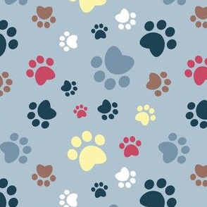 Small scale // Paw prints // pastel blue background white blue yellow red brown and navy blue animal foot prints