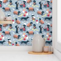 Tiny scale // Hot dogs and lemonade // pastel blue background Dachshund sausage dogs