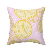 Fresh Lemonade - Slices of lemon on a pink background