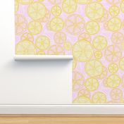 Fresh Lemonade - Slices of lemon on a pink background