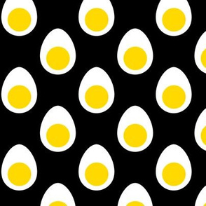 Medium Yellow and White Hard Boiled Eggs on Black