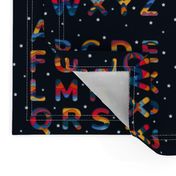 Rainbow Alphabet, paper cutout, colorful with white stars