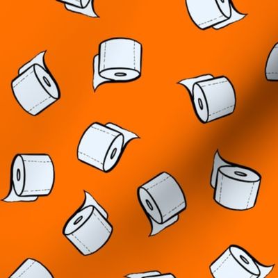 Toilet paper tissue rolls on bright orange