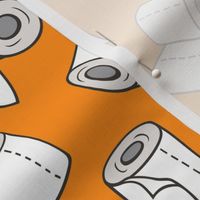 Trendy Toilet Paper Tissue Rolls on Orange