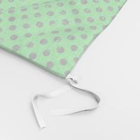 distress black polka dots on neon green