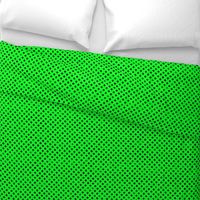 distress black polka dots on neon green