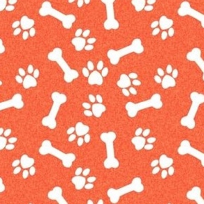 bones and paws fabric - dog bones and paw prints - orange