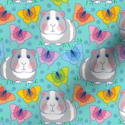 guinea pigs with butterflies and polka dots on teal