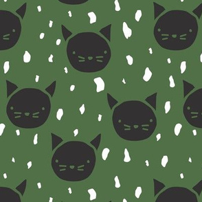 wonky cat faces // black cats on green