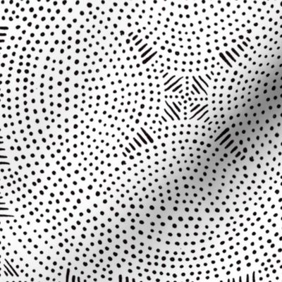 Black and white circles and dots