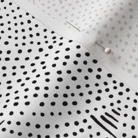 Black and white circles and dots