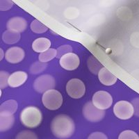 small bokeh dots on purple
