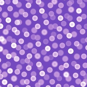 small bokeh dots on purple