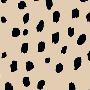 Black speckle marks animal print on Warm Beige