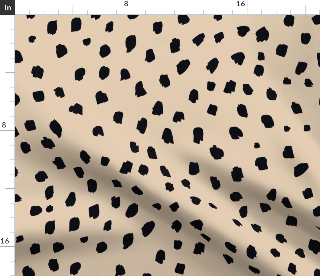 Black speckle marks animal print on Warm Beige