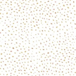 Gritty spots and speckle latte beige on white