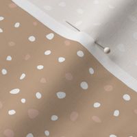 Little spots and speckles panther animal skin abstract minimal dots in white coral on latte