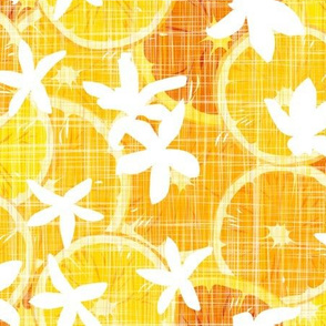 white orange blossoms on linen texture citrus slices