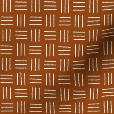 mudcloth basket weave, white on rust