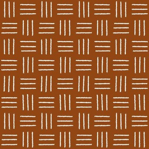 mudcloth basket weave, white on rust