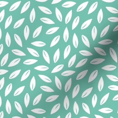 White tossed leaves on teal