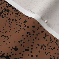 Ink speckles and thick stains spots and dots messy minimal boho design Scandinavian style nursery moody rusty copper black