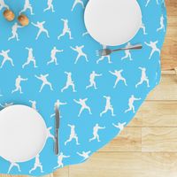 Baseball Player Silhouettes in White on Light Blue Background