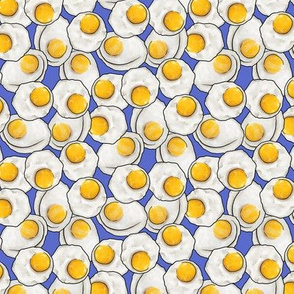 Fried egg feast on blue