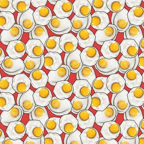 Fried egg feast on red