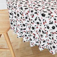 soccer balls sports pattern with pink and red hearts