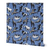 Small scale // Safari geo animal // non directional design blue background black and white safari animals