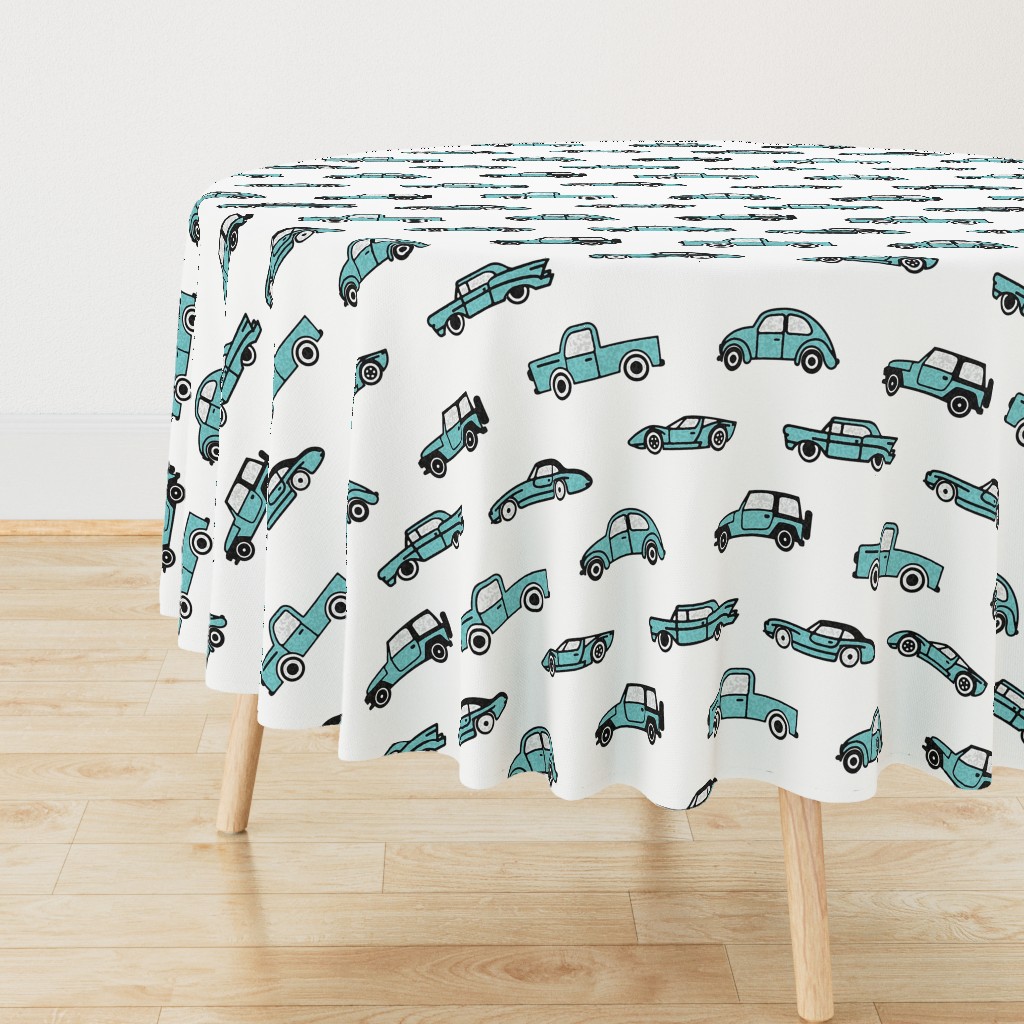 Cars Driving Around Teal Blue