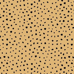 Little spots and speckles panther animal skin abstract minimal dots in mustard yellow