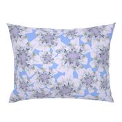 pale lilac flowers with blue background