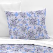 pale lilac flowers with blue background