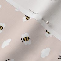 Little buzzing bumble bees and clouds spring summer sky nursery design pale nude pink yellow girls