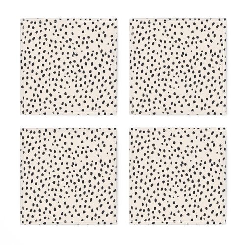 small black speckle marks creamy beige abstract gender neutral baby nursery