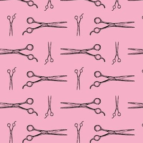 Hair Cutting Shears in Black with Baby Pink Background
