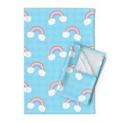 Fun and Bright Cartoon Rainbows with Clouds in a Blue Sky