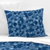 Abstract flower doodles blue toned pattern